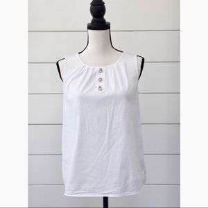 White sleeveless blouse with gold bumble bees